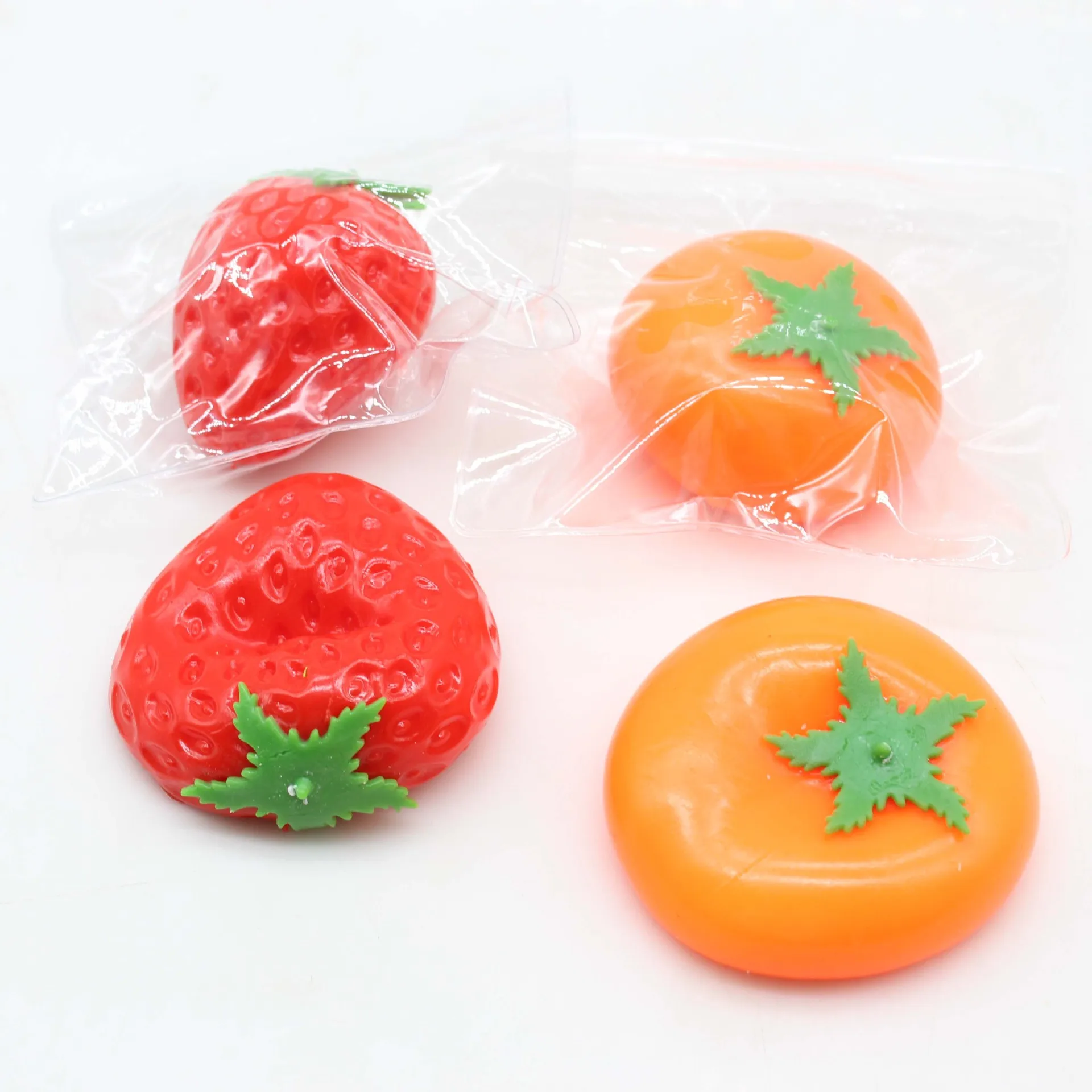 Hot selling simulated soft fruit squeeze toy fun soft persimmon vent relief toy