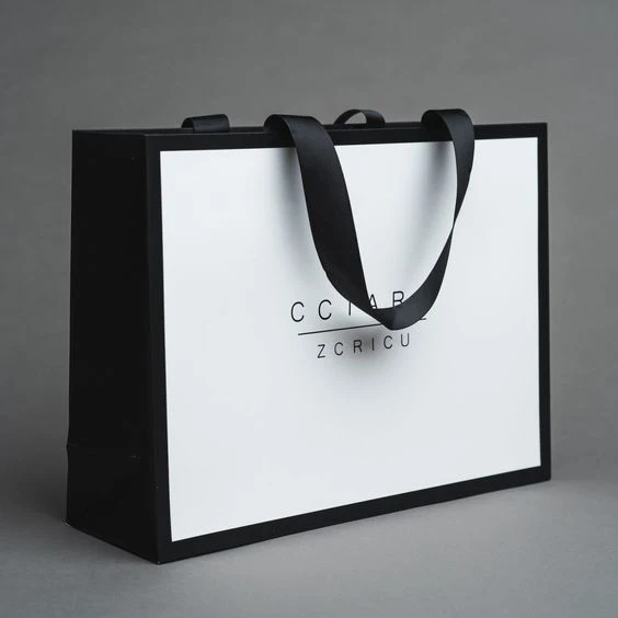 Custom Luxury Clothing Retail Packing Bag White Gift Bag bolsas de papel Shopping Packaging Paper Bags With Handles For Clothes