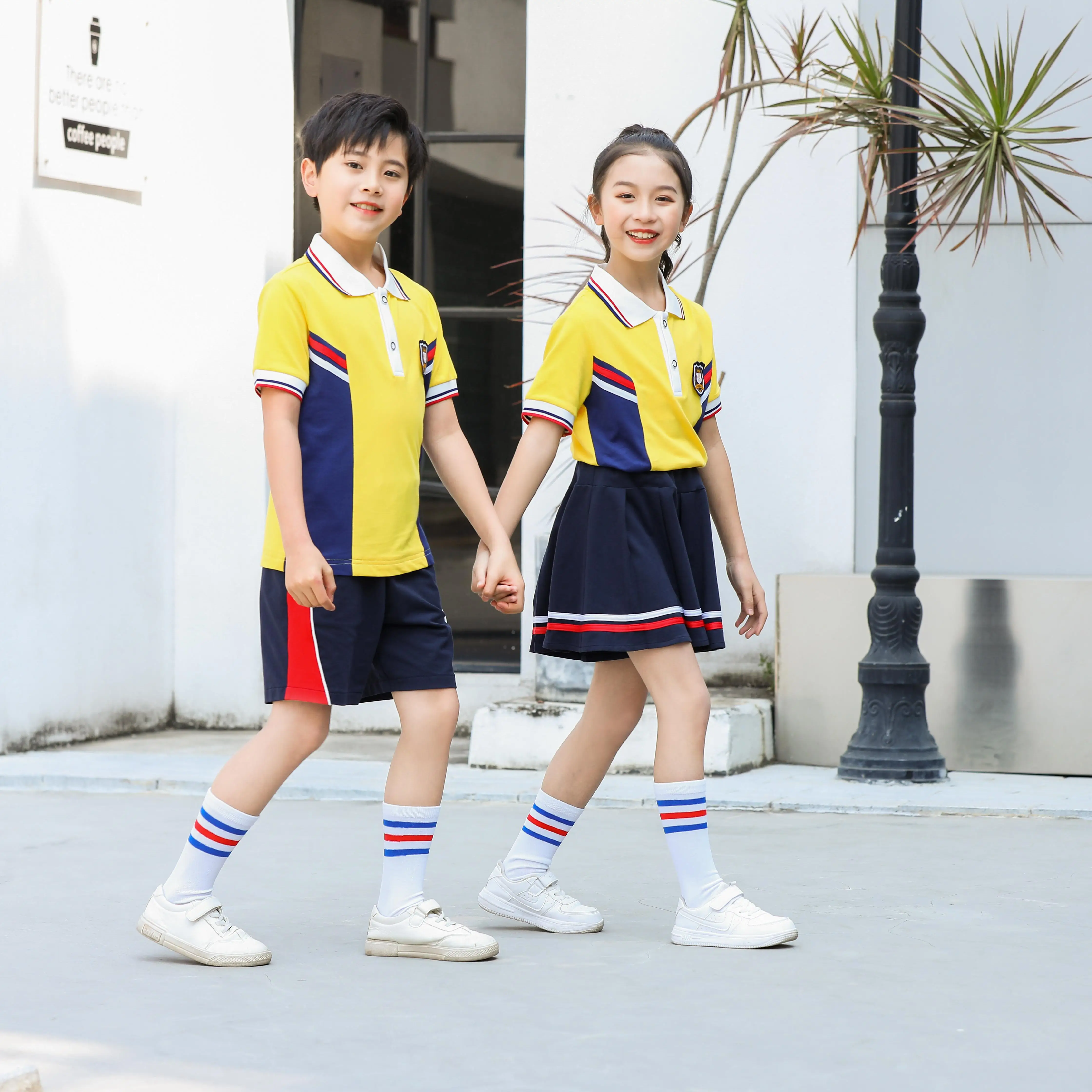 Custom yellow t polo shirt design for girls with school logo kids primary sport uniform manufacturers school uniform design