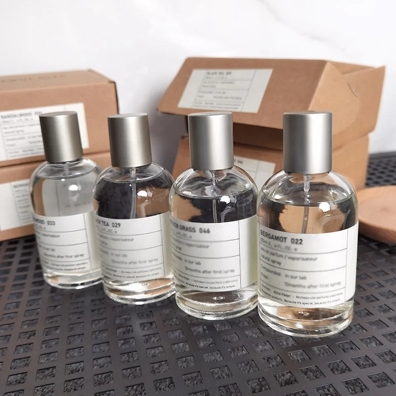 Customized round empty clear perfume glass bottle 50ml 100ml glass spray perfume bottle with metal cap