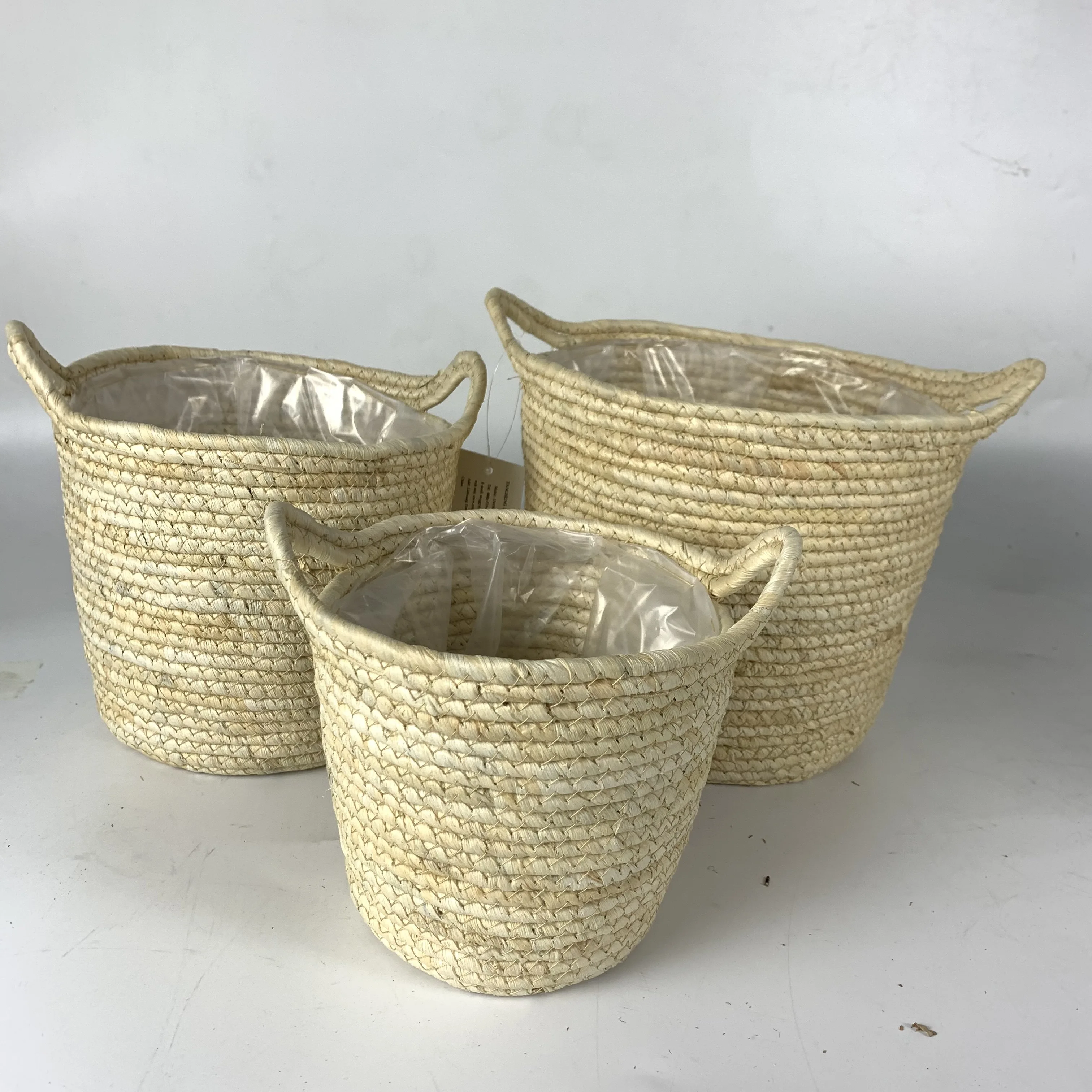 New design wholesale outdoor grass weaved baskets artificial plant flower pot for decoration