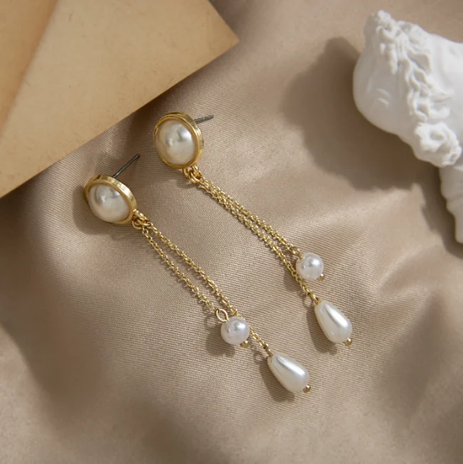 Stock lot South Korea Dongdaemun fashion style long tassel water drop pearl 925 silver needle earrings female