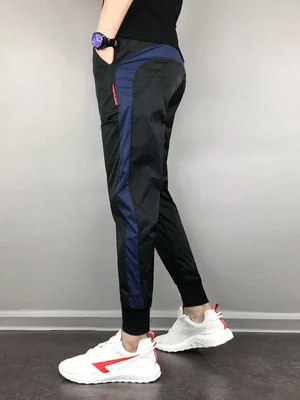 FanLi Men Loose Fit Reflective Printing Drawstring Windbreaker Mesh Lined Sport Track Pants