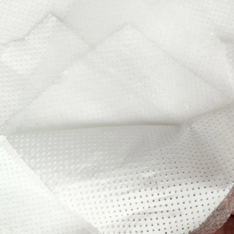 Non woven and breathable film laminated fabric for surgical gown