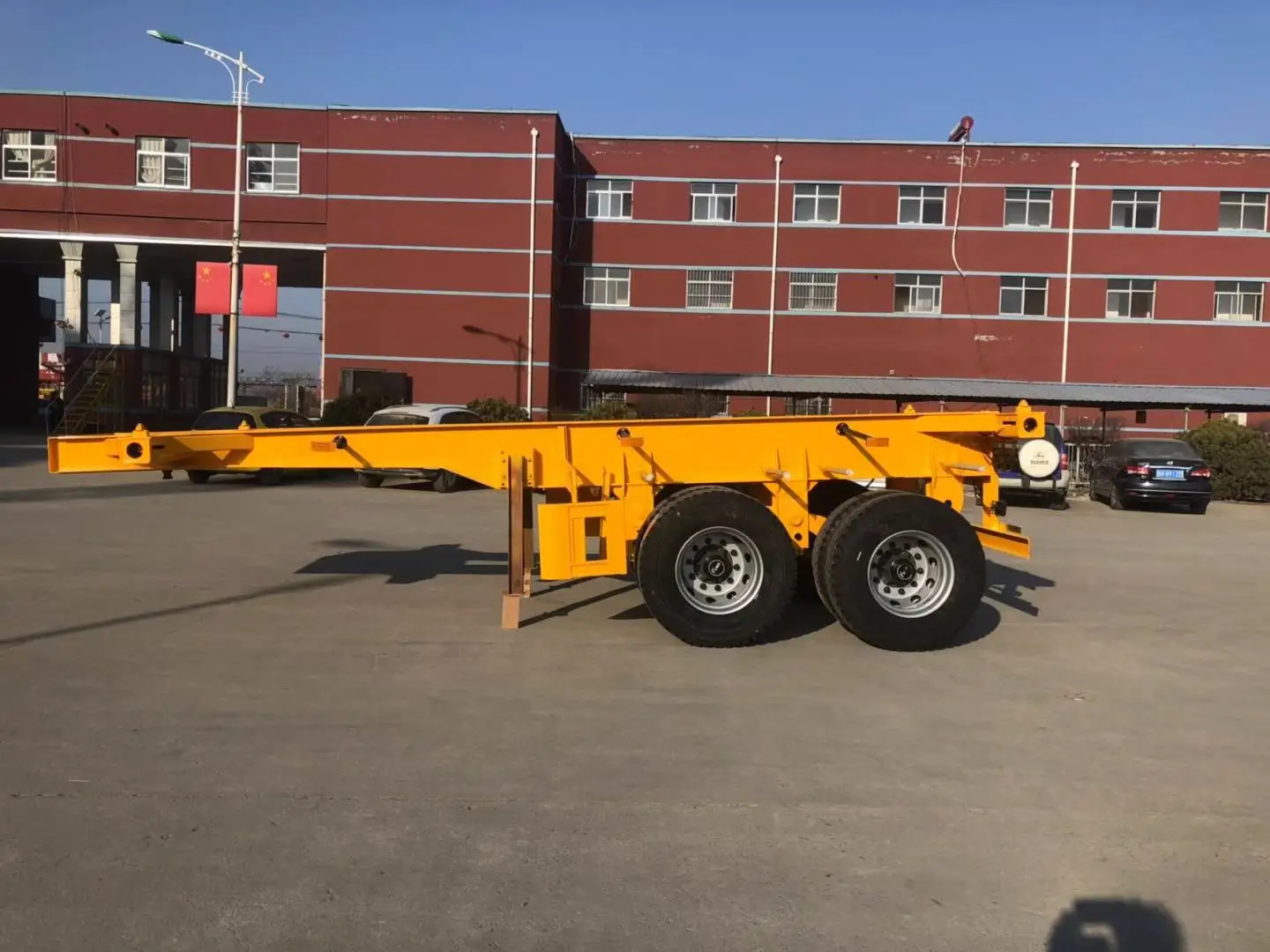 Трёхосный Q345 Фува оси прицепа/20 футов 40ft контейнер шасси/контейнерные перевозки полуприцеп для продажи