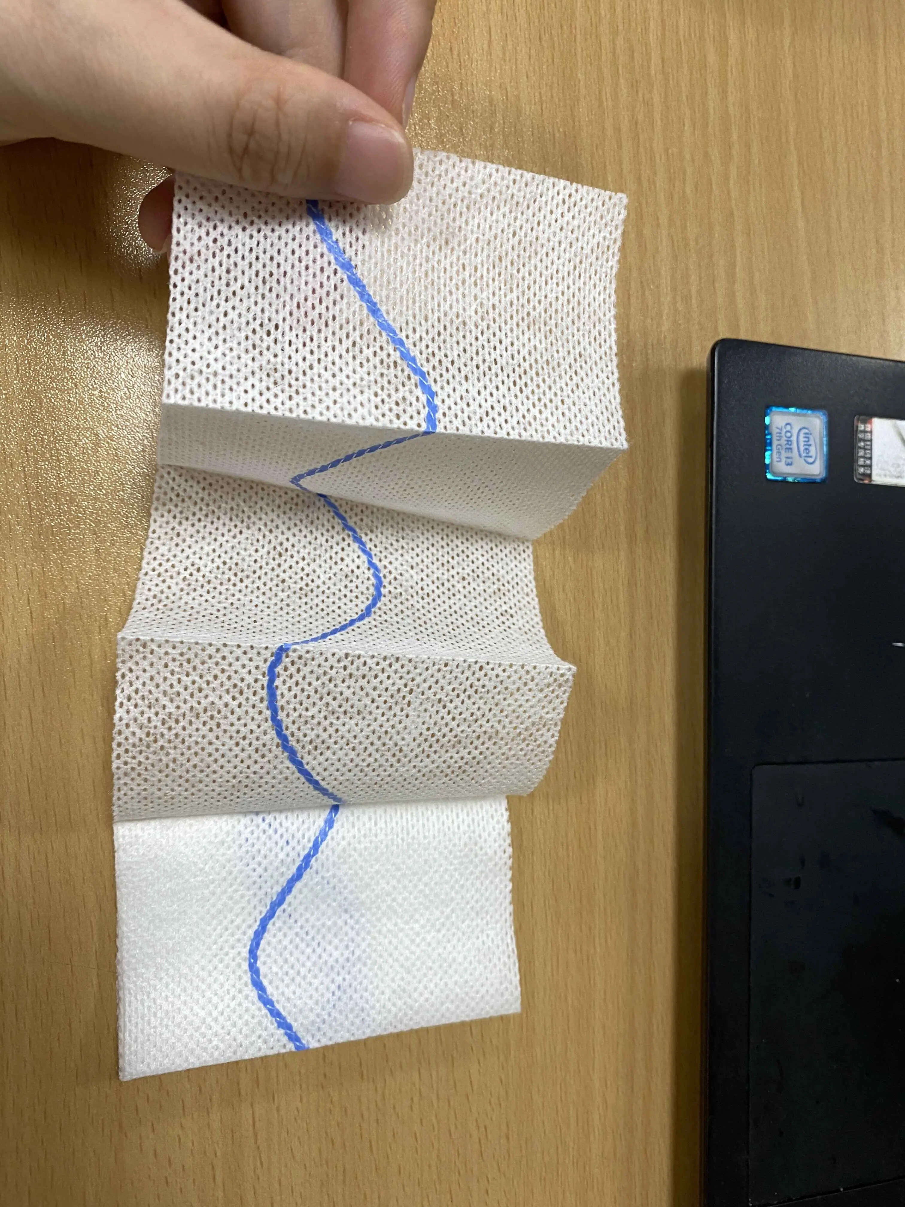 Z-folded gauze with coagulant factor