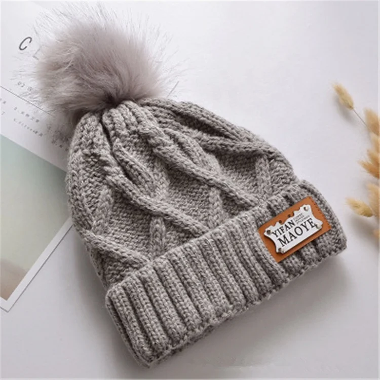 
Wholesale Winter Unisex Winter Blank Knitted Leather Label High Quality Pom Pom Beanie Hat 