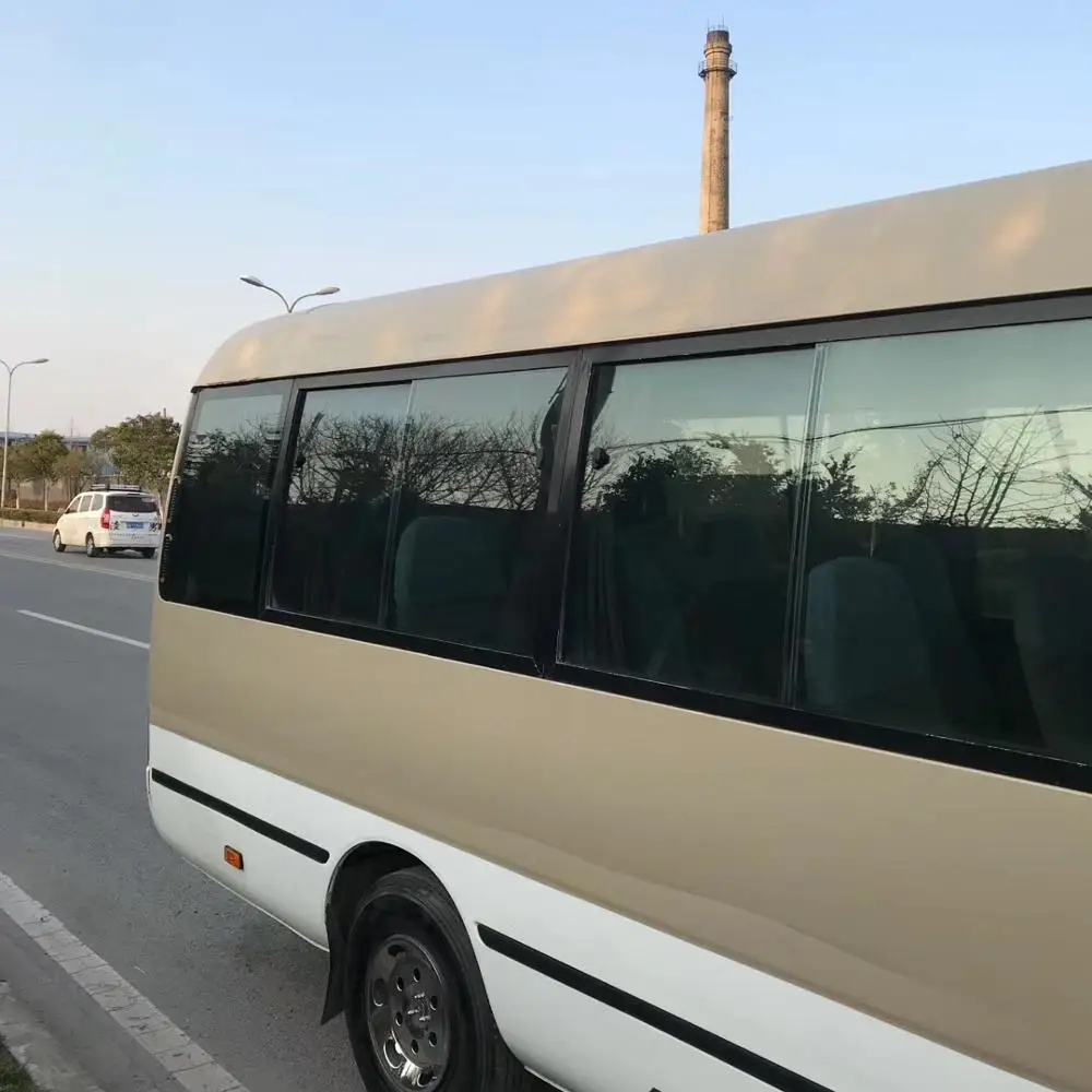 
LHD 2016 Japan used good condition Toyotai coaster bus with diesel engine 27 seats white golden cheapnfor seal 