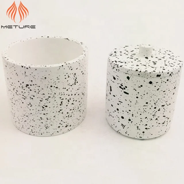 Square concrete candle vessels with marble style surface