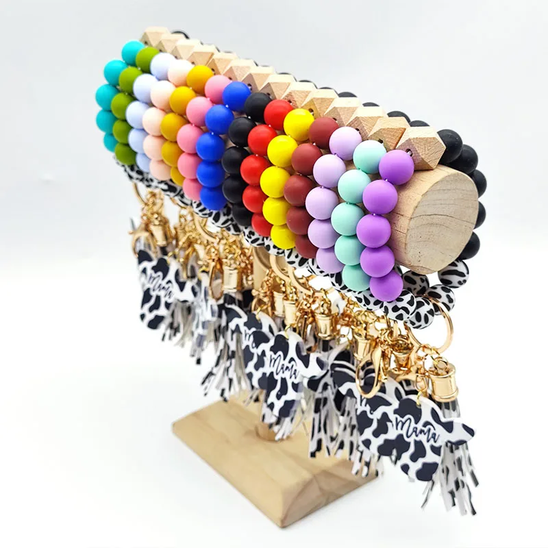 Wholesale Mama Silicone Beads Leather Tassel Bracelet Keychain Beaded Silicone Wristlet Cow Print Keychain With Cow Head Tag