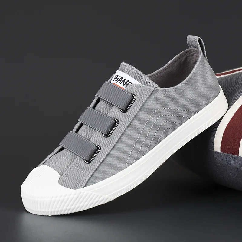 Summer breathable flat trendy canvas skateboarding shoes leisure round toe men canvas sneakers