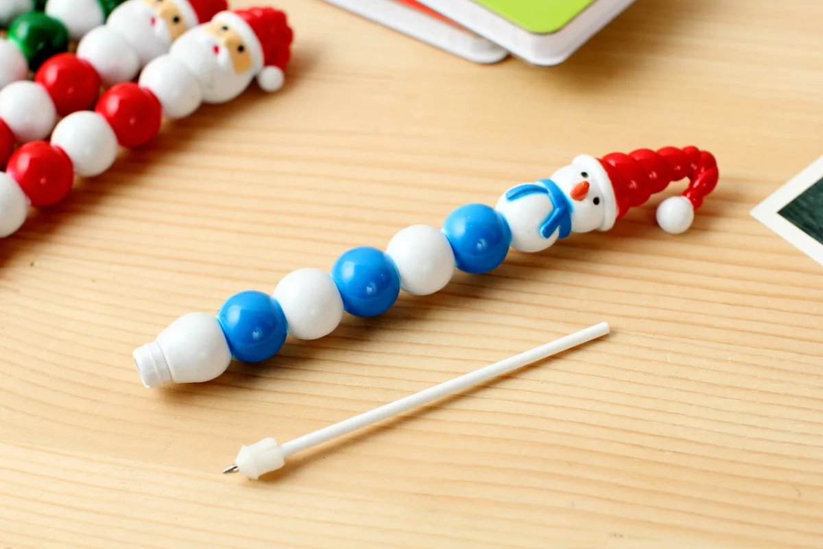 Custom cute santa snowman tree christmas stationery gift pen sarasa ball pen for children kids