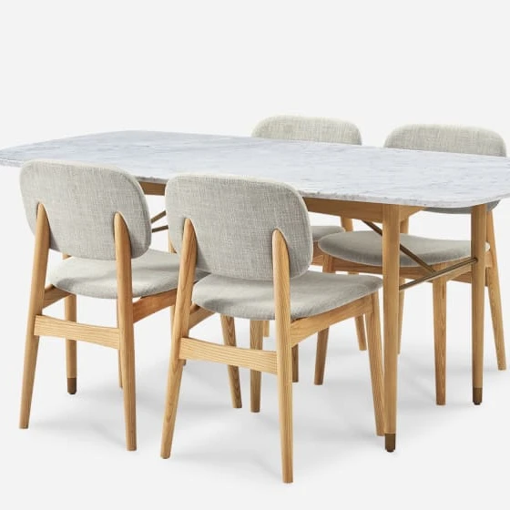 The newly designed luxurious and fashionable marble dining room table set equipped with four chairs