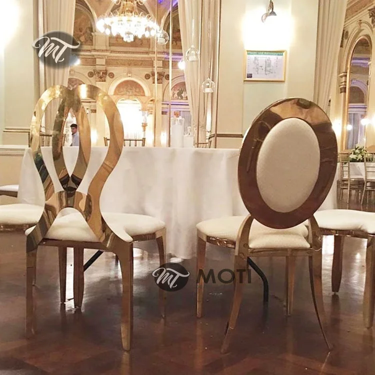 Wedding hole oval back gold dining chairs stainless steel leather