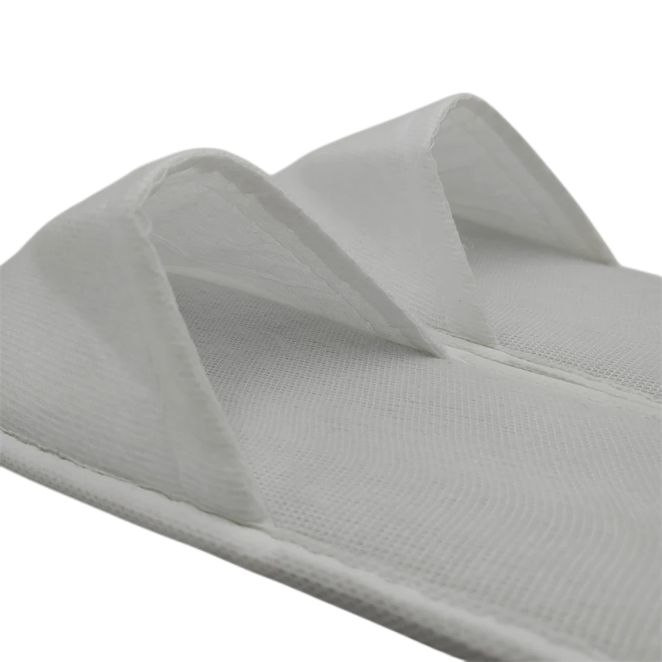 Прочные в использовании Горячие пользовательские логотип белые распродажа Нескользящие одноразовые Тапочки для отеля