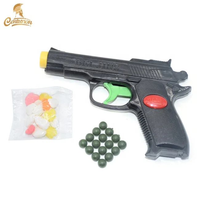 shantou wholesale mini gun shaped whistle toy candy for kids