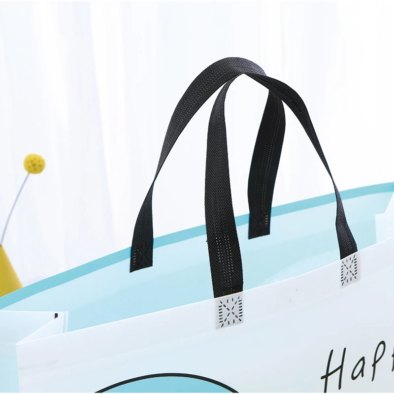 Cute cartoon fashion various specifications tote bag non-woven environmental protection packaging bag toy store can carry the ba