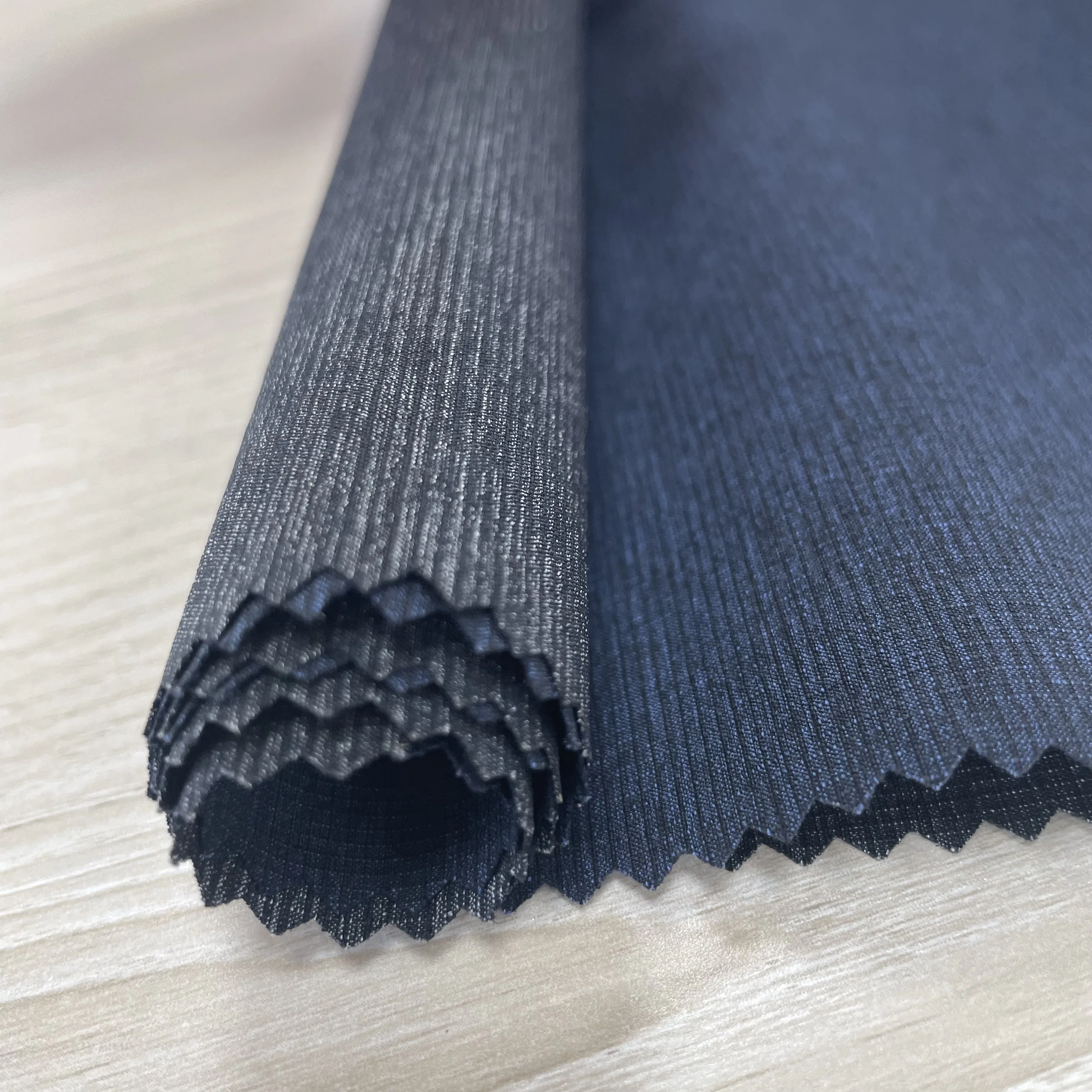 45% Nylon 45% Polyester 10% Spandex 0.15 Ribstop 4 Way Stretch Fabric