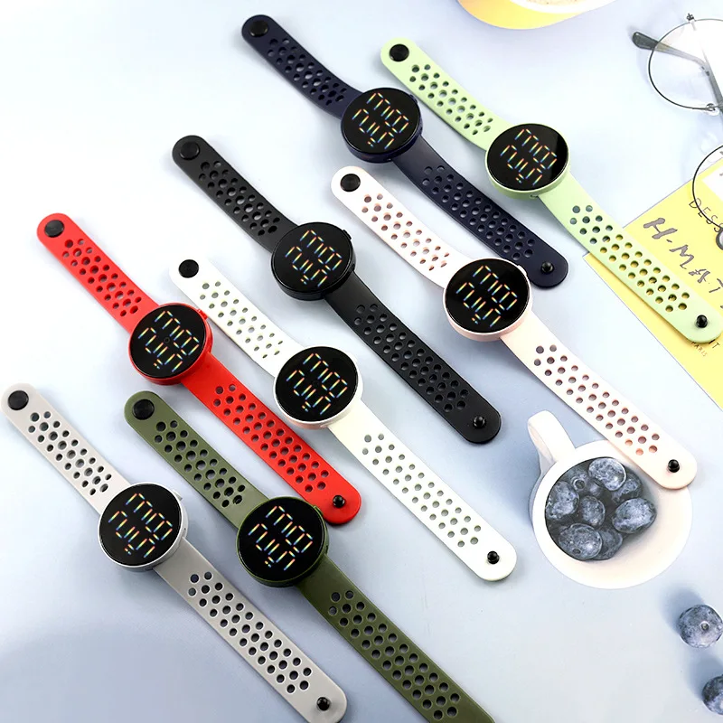 Wholesale fashion led bracelet watch men and women can rainbow 7 lights digital hand electronic watch men and women sports watch