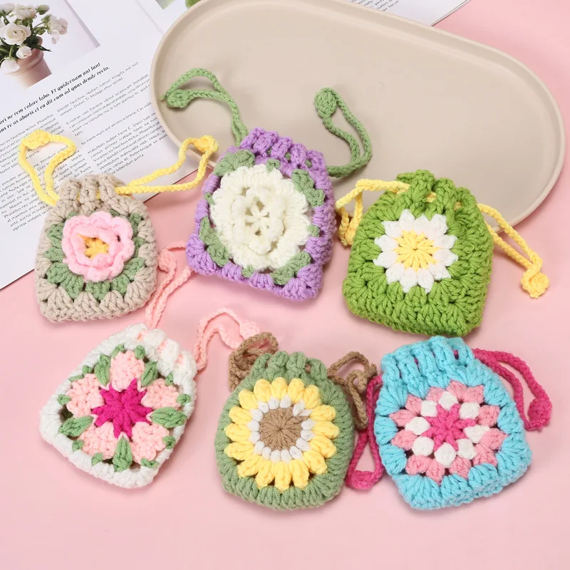 Hot selling Small flower woven coin purse Bluetooth earphone protective cover yarn woven keychain crochet hook small bag