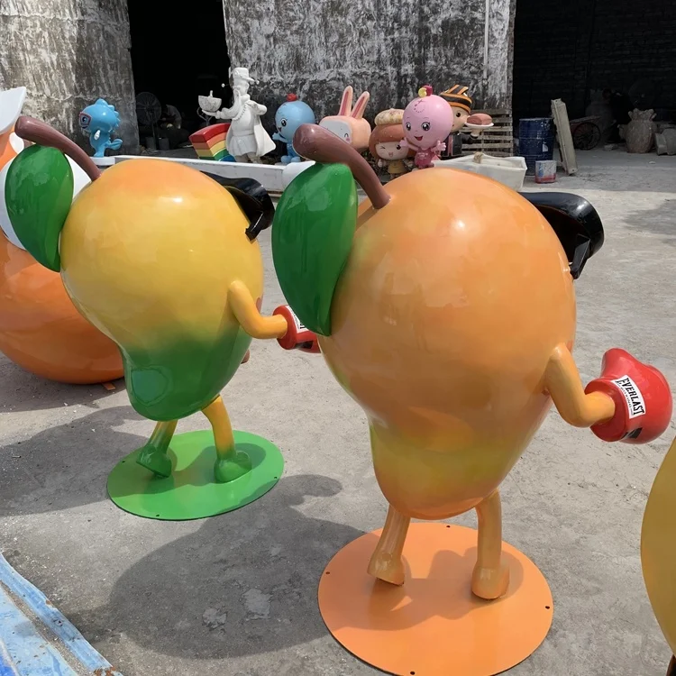 A cartoon sculpture of a glass fiber reinforced plastic mango Fruit model ornaments Outdoor cartoon  Resin fiber figuresculpture