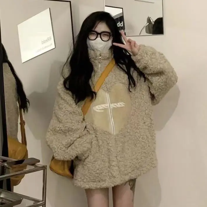 Luxury environmental protection imitation otter rabbit long fur fur coat women 2023 new mink fur coat factory direct sales.