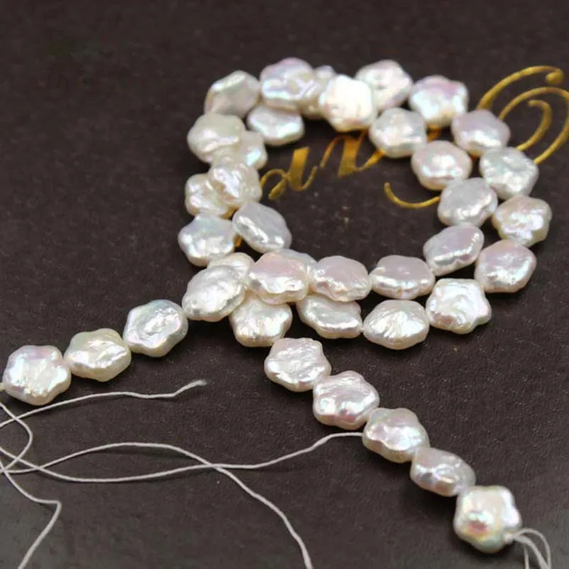 13 mm flower shape baroque loose freshwater pearl in strand .