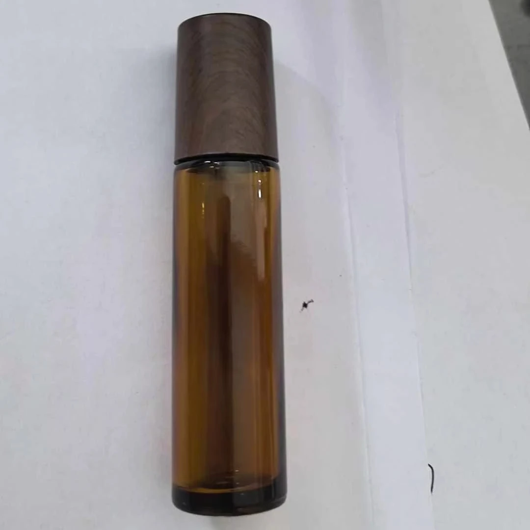 15ml mini amber round roller on essential oil glass bottle with wooden cap
