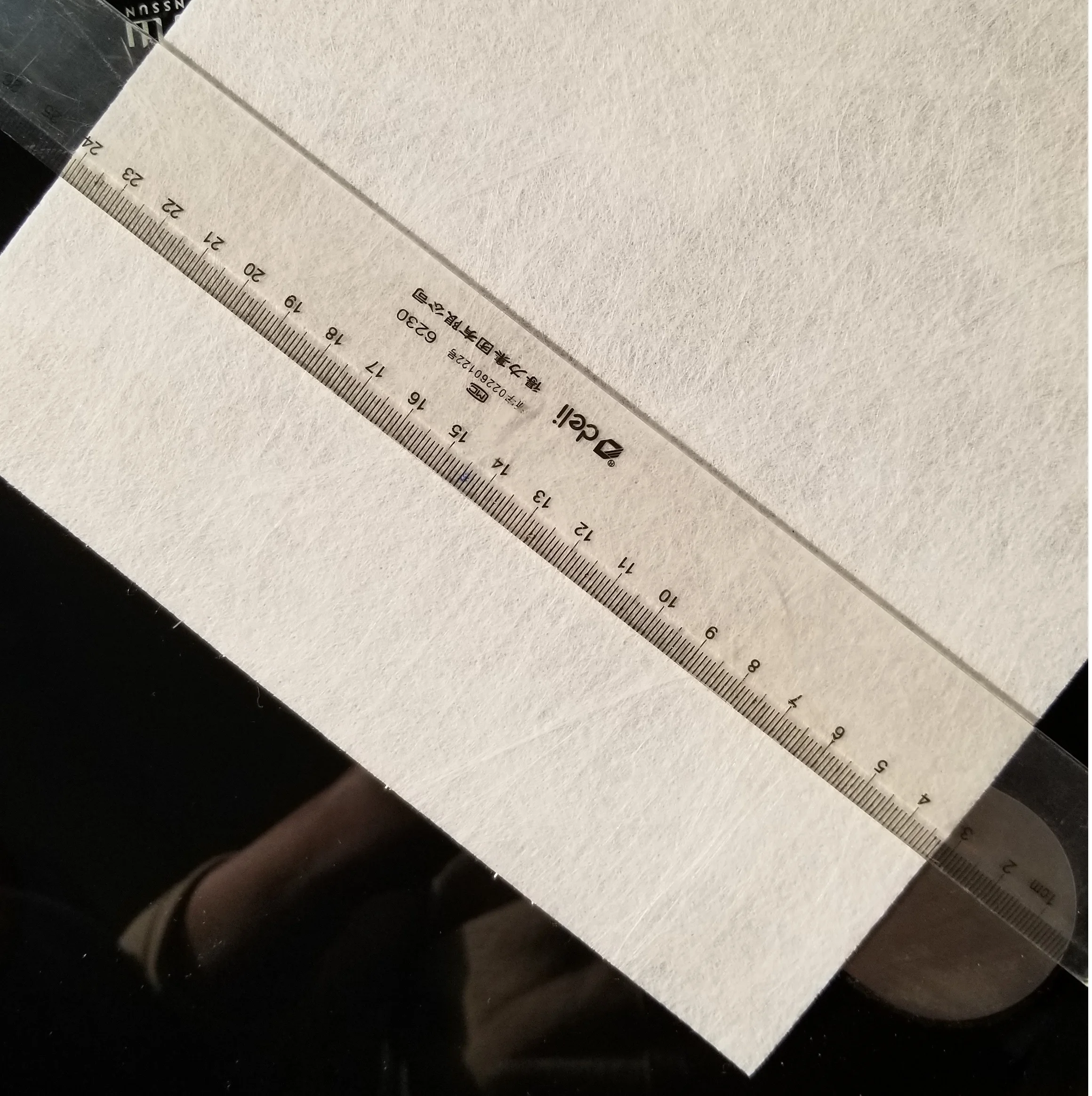 Reinforced spunbond polyester mat for APP/SBS waterproofing membrane