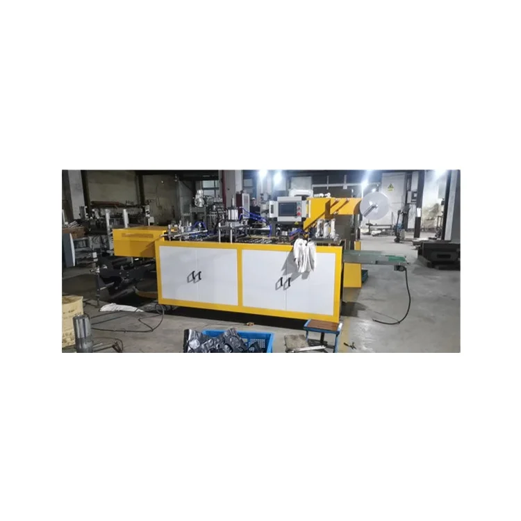 Машина для изготовления крышек для бумажных стаканчиков