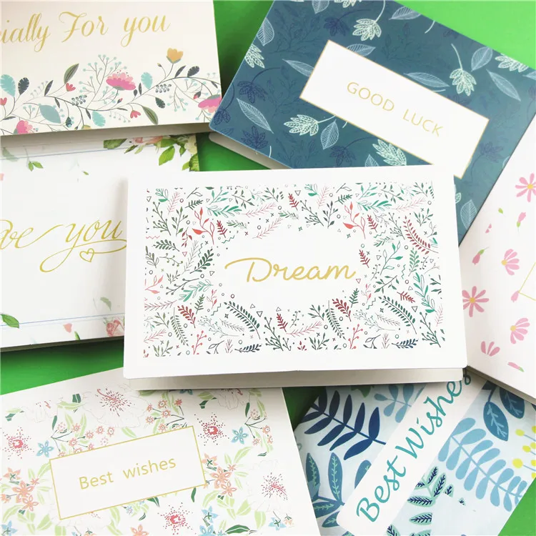 Customized flower thank-you cards with wild flowers, accompanied by envelopes. Floral blank greeting cards