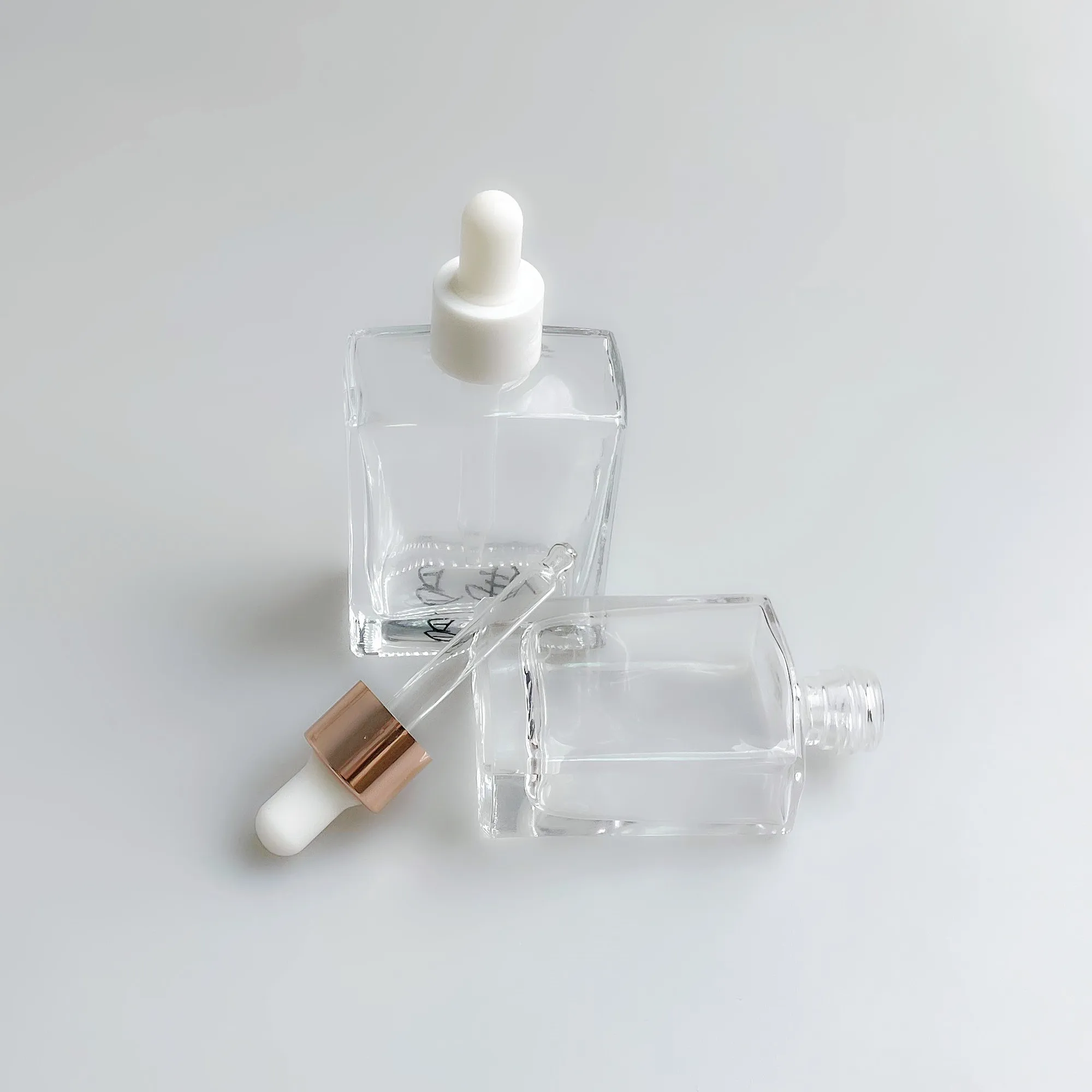 square shoulder dropper bottle new design perfumes square glass dropper bottle clear glass with dropper