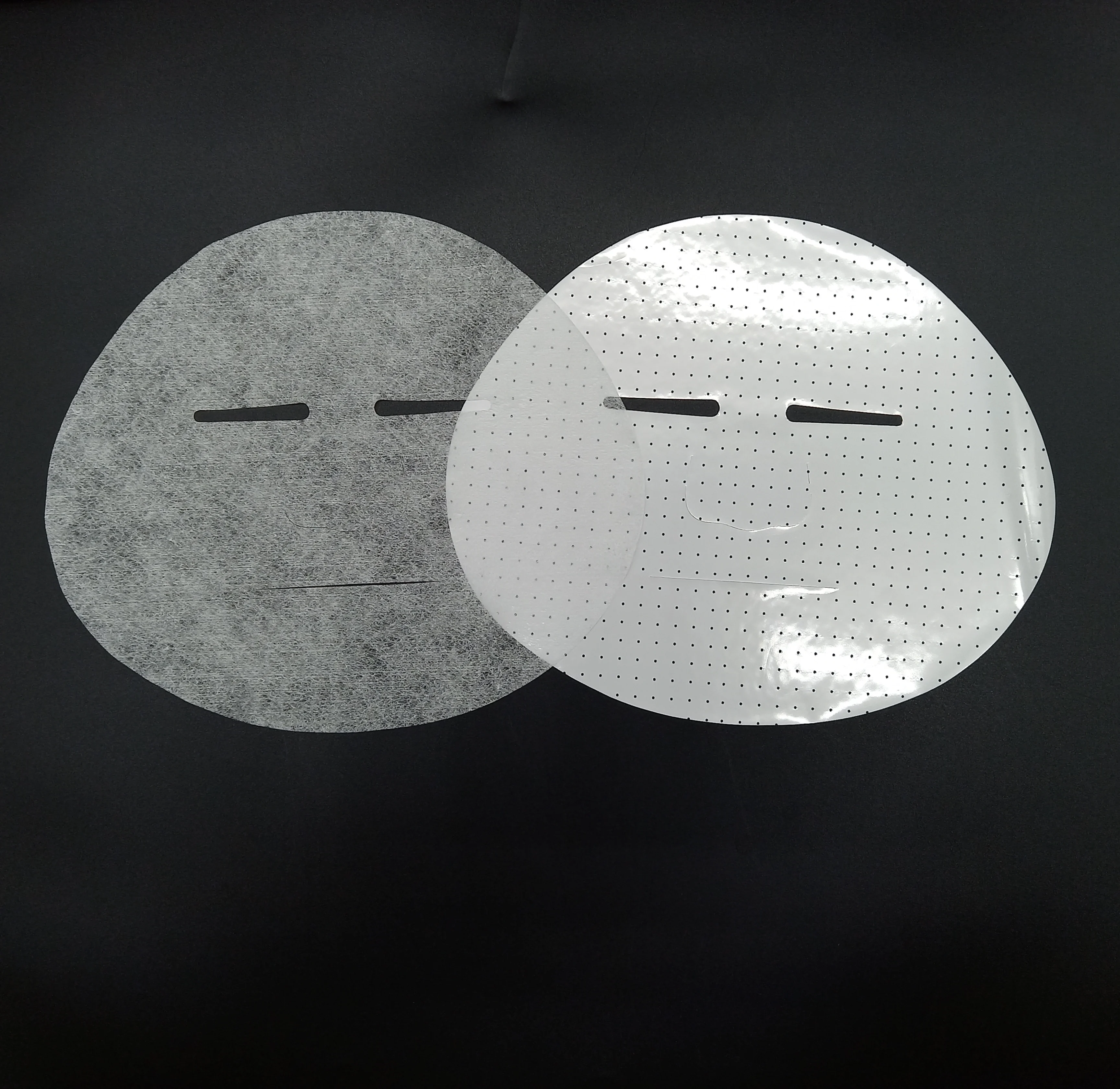 OEM  Invisible  Die-Cut 23gsm White Lyocell Viscose Spunlace Nonwoven Beauty Care Dry  Facial Mask Sheet