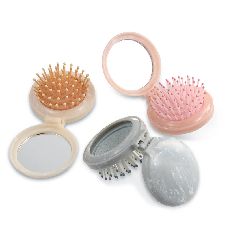 Detangling mini makeup Travel Hair brush folding pocket pop-up marble hair brush with mirror Insoluble masterbatch marbling