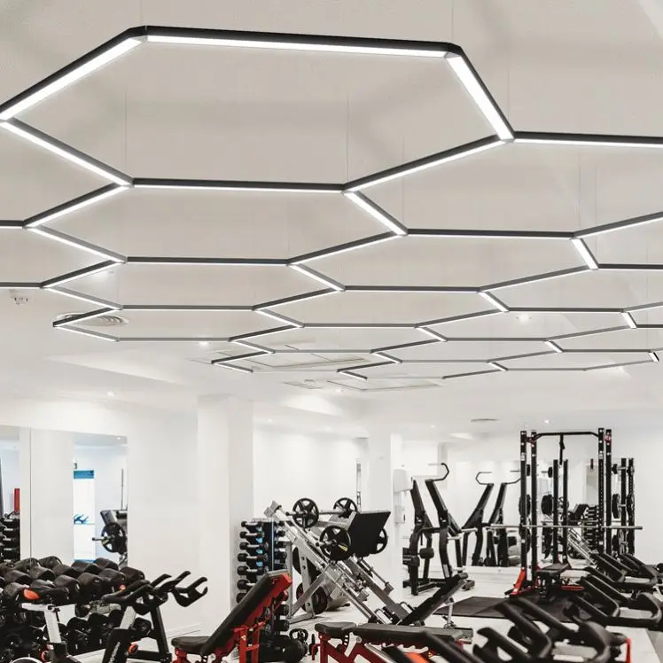 Linear long strip chandelier used in commercial space and capable of combined connection and intelligent dimming