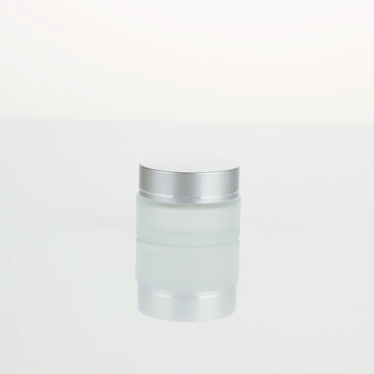 Empty glass jar with silver cover for stock Cream 50ml 100ml frosted empty glass frosting cans cosmetic packaging