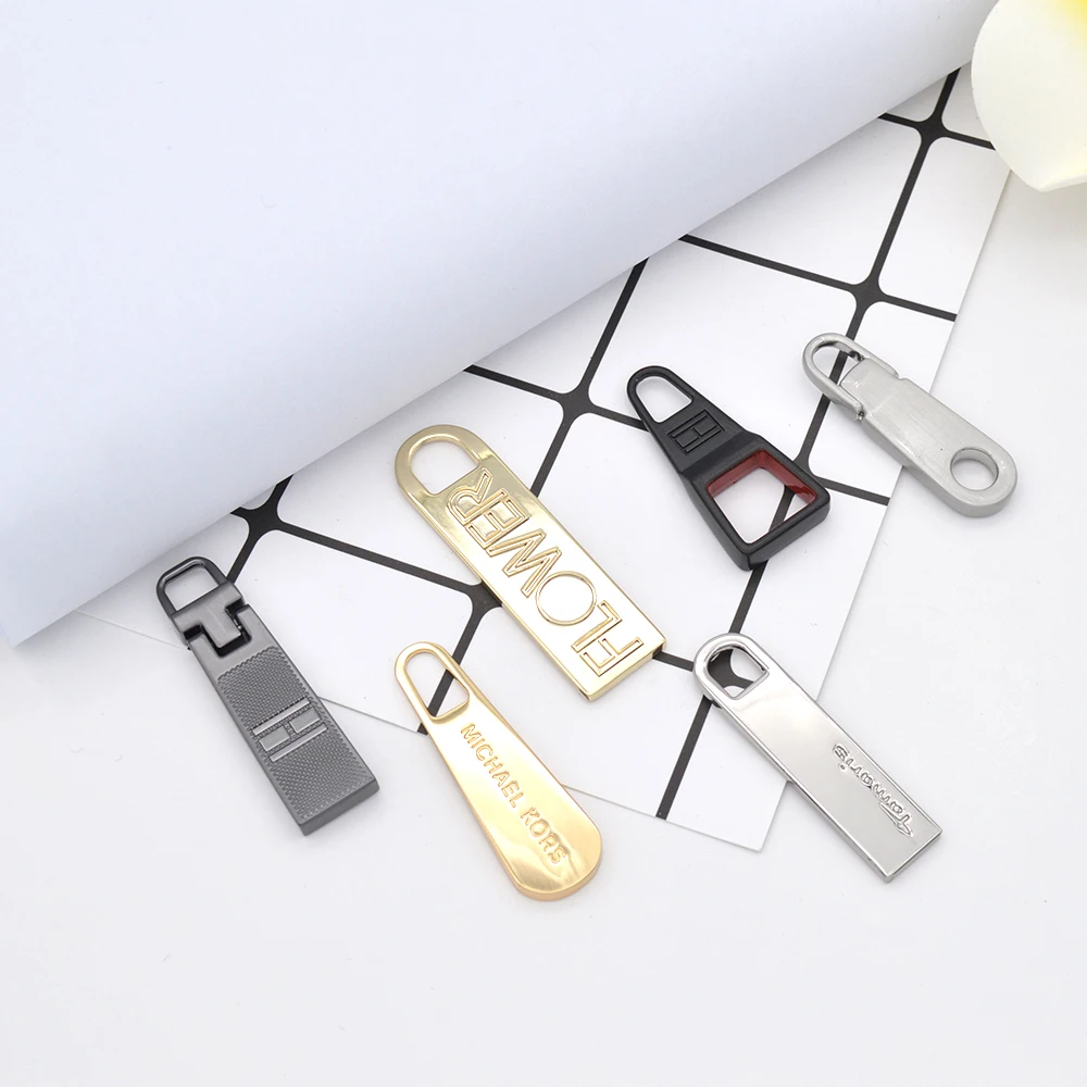 Fashion handbags and bags custom metal zinc alloy zipper slider hallow angel zipper puller for bags