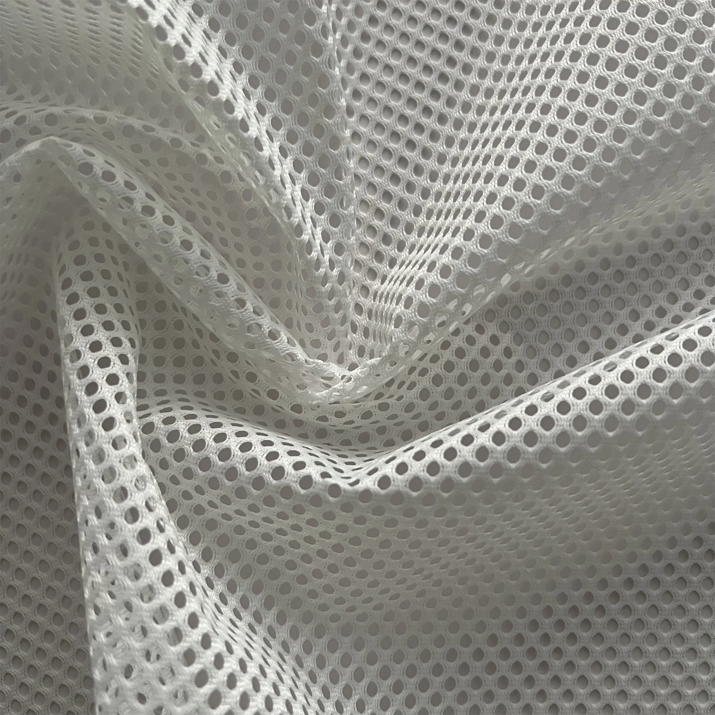 Polyester non-elastic glossy double-eye hexagonal coarse mesh fabric for casual hats and lining composite