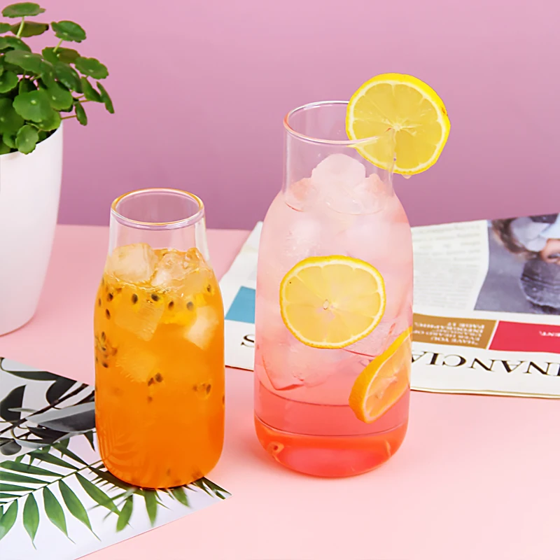 Kitchen Glass Storage jar with cork lid glass water bottle manufacture OEM  jars with unique feeder shape for honey