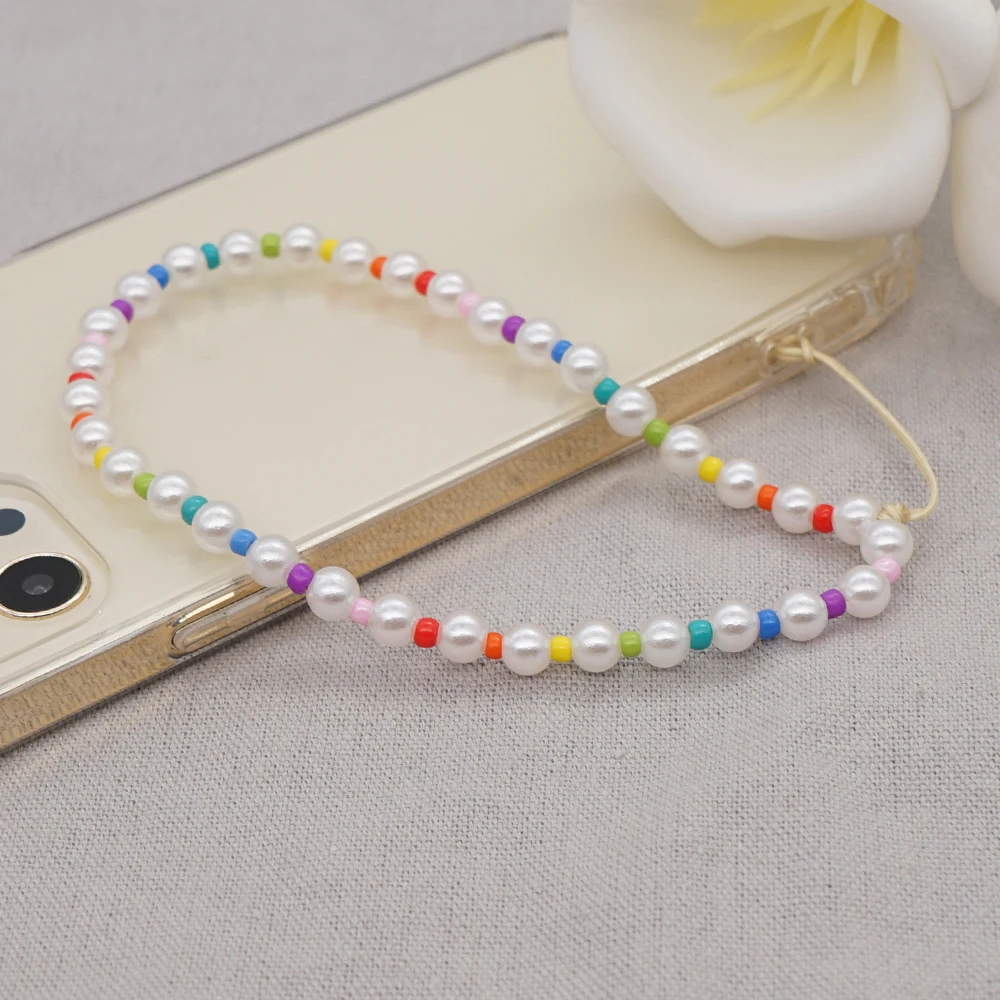 Dvacaman Модный корейский держатель для мобильного телефона с жемчужинами цветные бусины ремешок для телефона Очаровательная Ручная работа защита от потери на запястье на лето