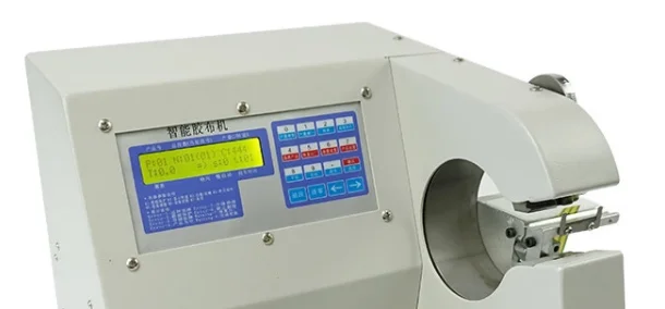 Automatic tape wrapping machine and coil winding machine