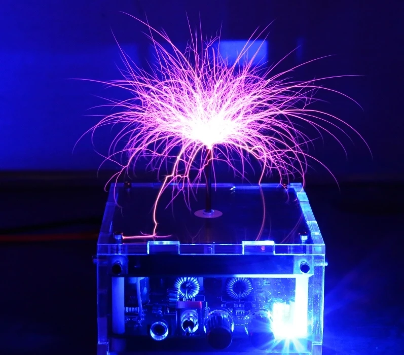 Integrated solid state Mini Music Tesla Coil AC110-240V 120W Palm Tesla Coil  Frequency Voltage Pulse Electric Arc Generator