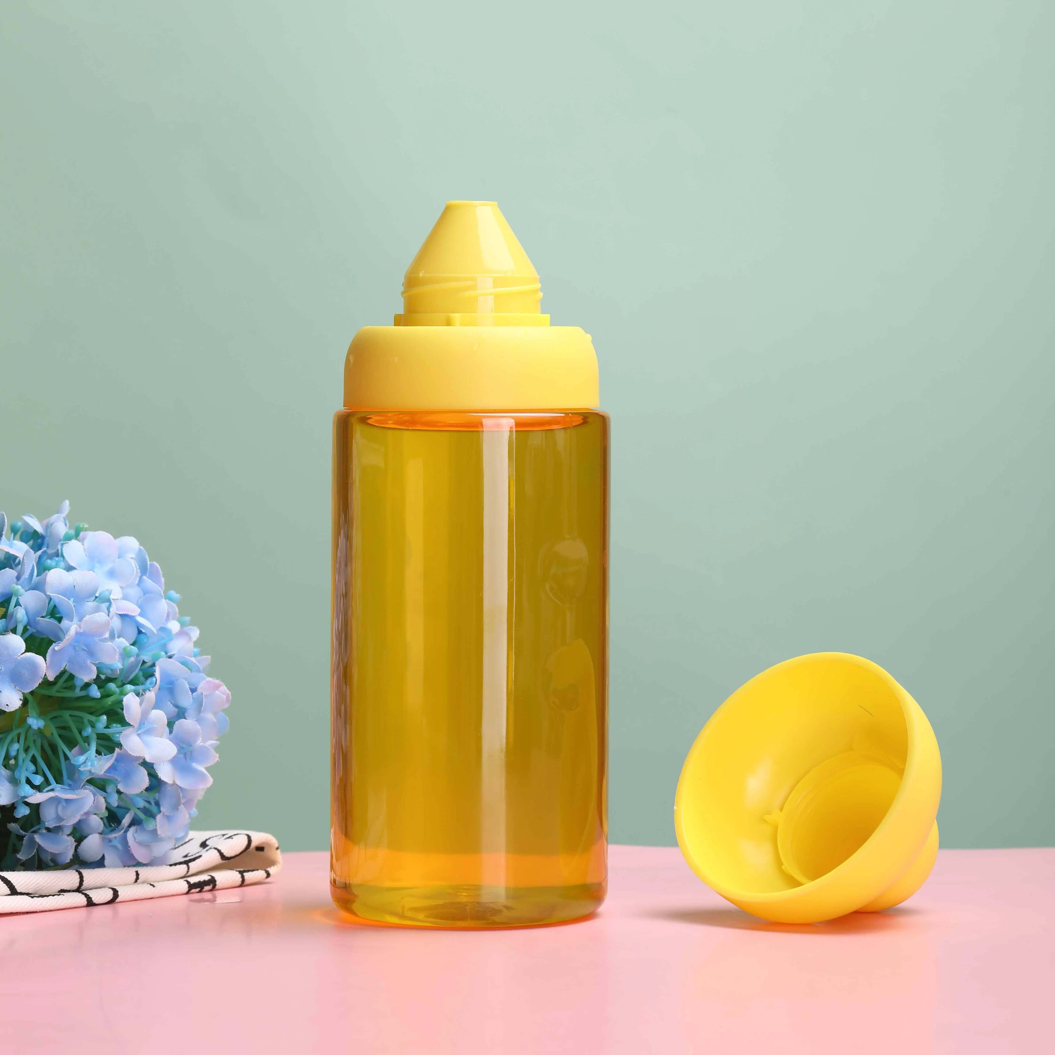 180ml 300ml food grade transparent honey jar PET plastic squeeze honey bottle with plastic caps
