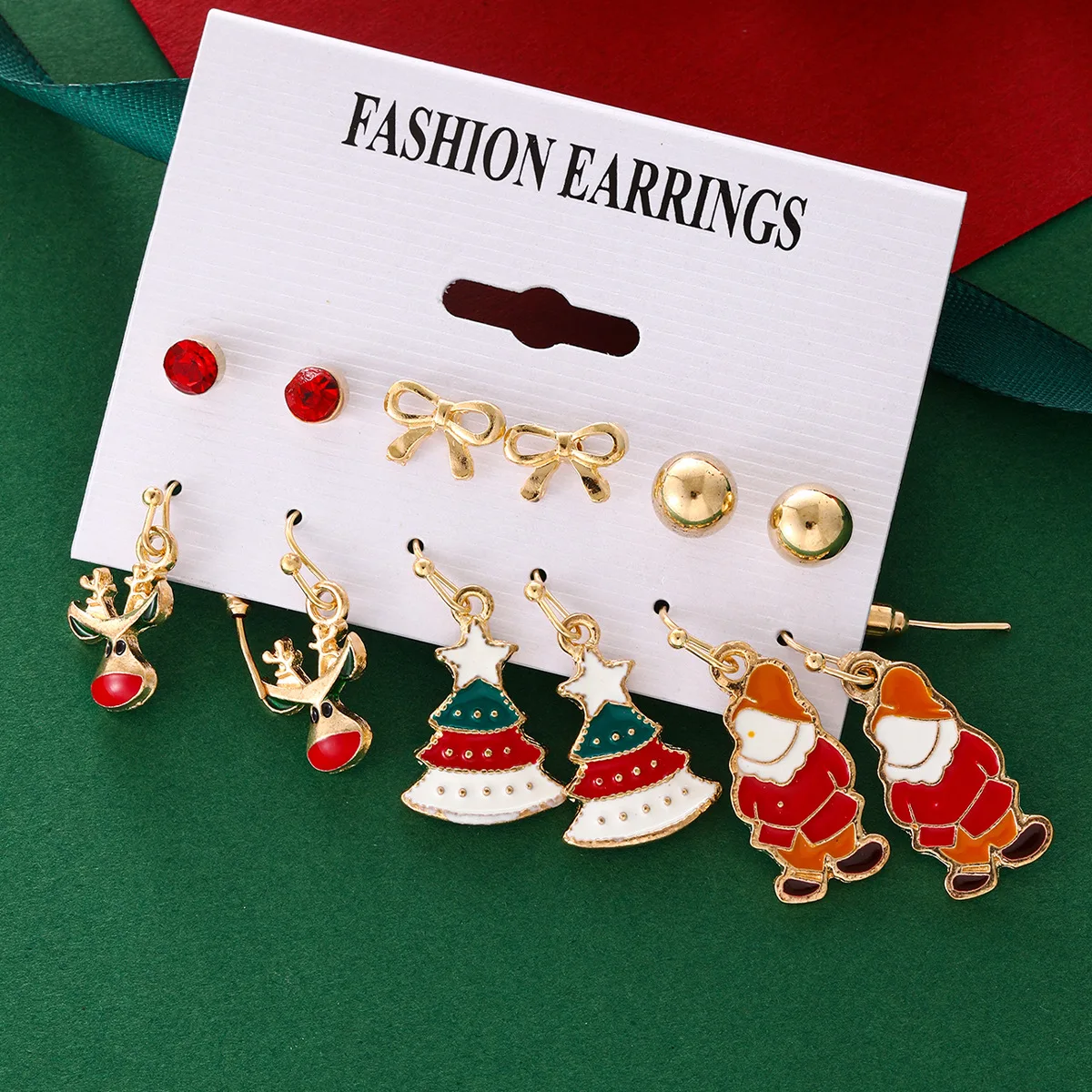 2024 New Christmas series snow bells earrings combination set foreign trade hot cartoon dripping elk old earring girl