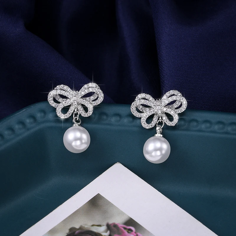 High Quality Rhodium Plated Shell Pearl and Cubic Zirconia CZ Crystal Pave Cute Bow Drop Earring