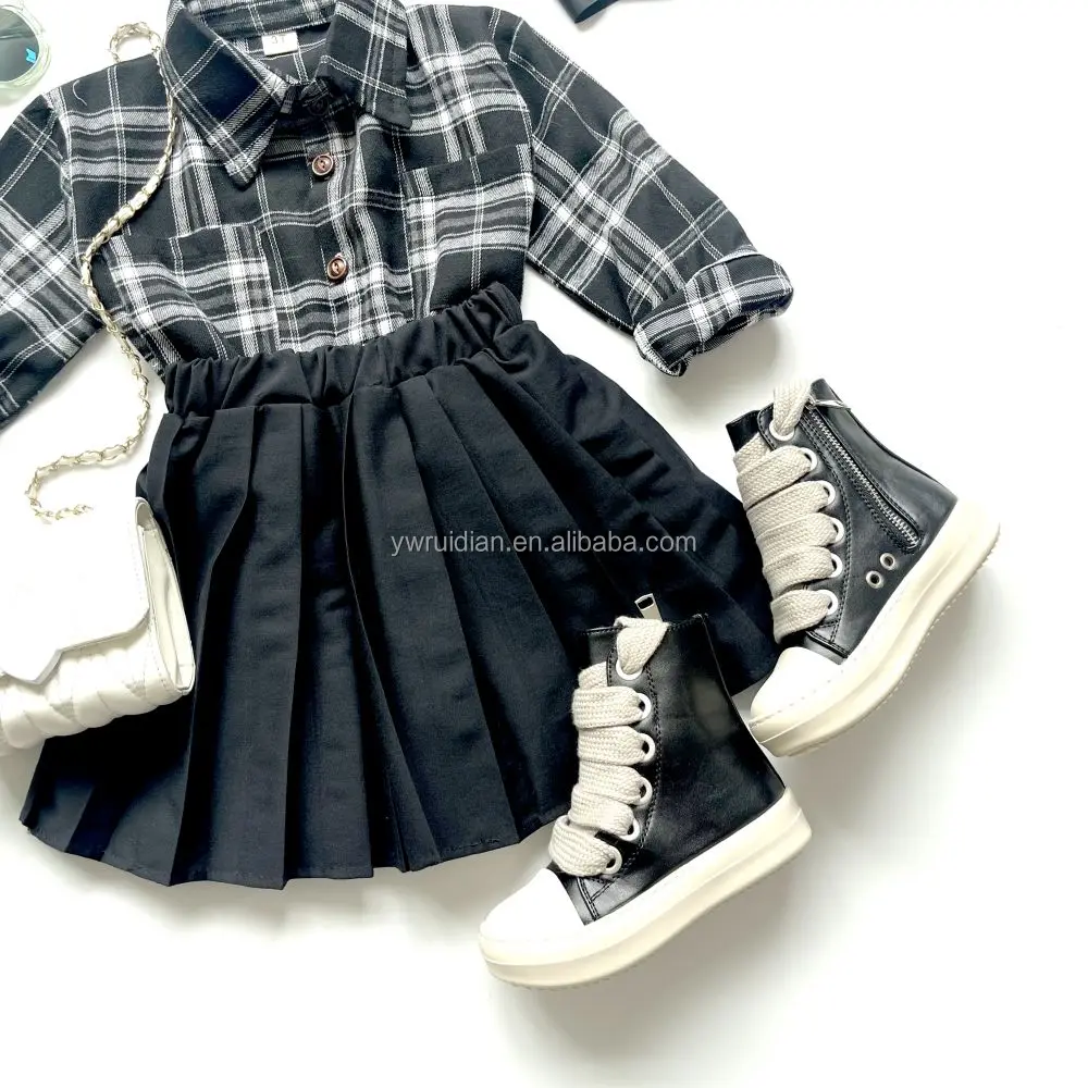 Yiwu Ruidian OEM Autumn Flannel Black And White Plaid Long-Sleeved Shirt + Black Pleated Skirt 2 Pieces Baby Girl Clothes Set