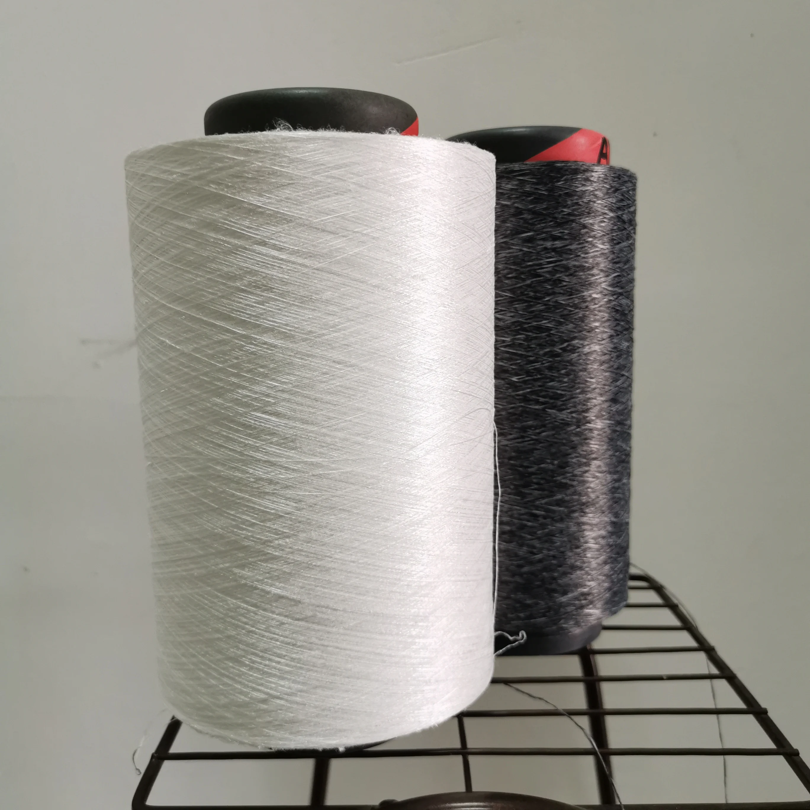 AIKI Machinery High light color fastness dope dyed Wholesale Polyester Air Textured Yarn ATY for olefin fabric