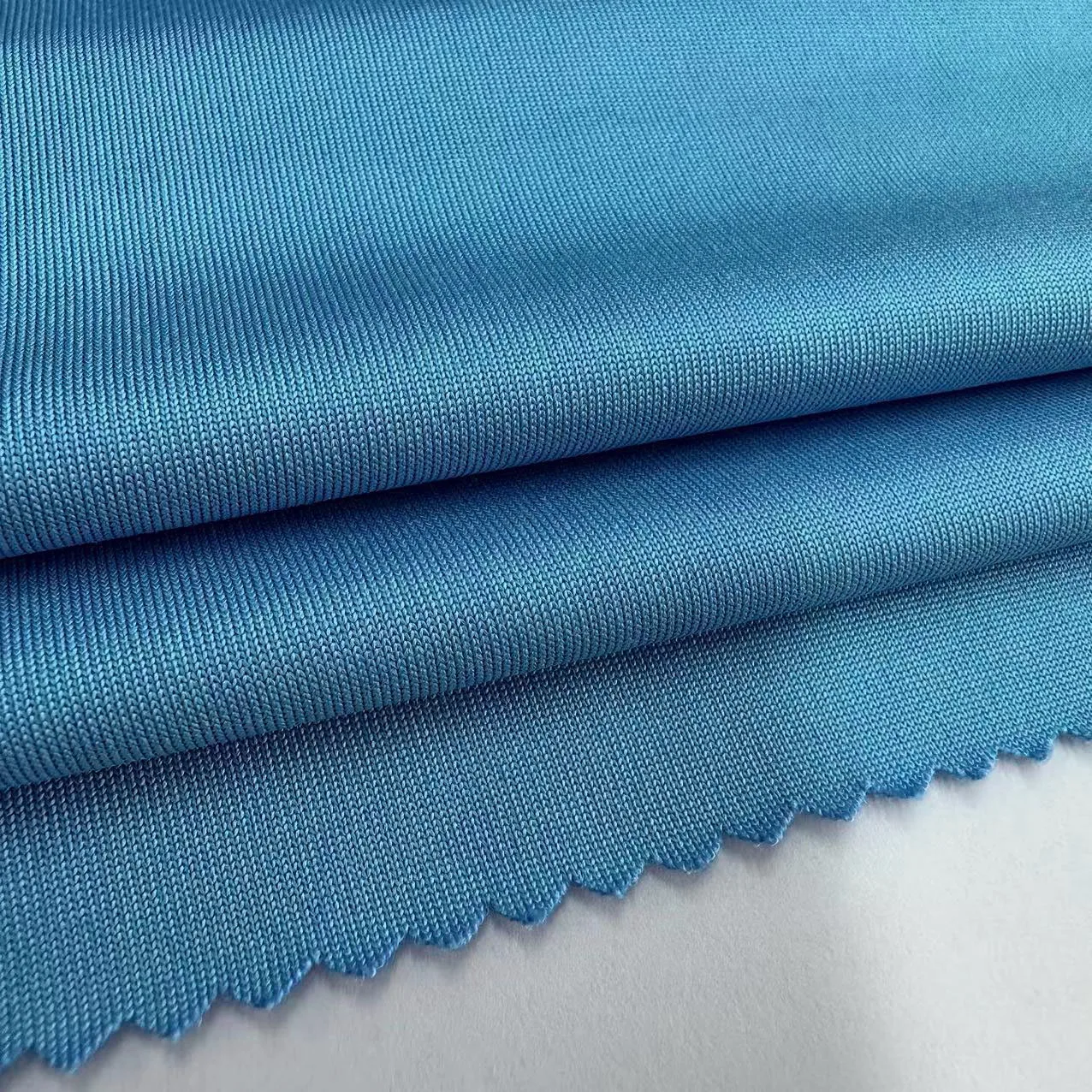 Stock 210gsm 4 Way Stretch knitted fabric 93% Polyester 7% Spandex Interlock Sport Fabric For Yogawear Leggings
