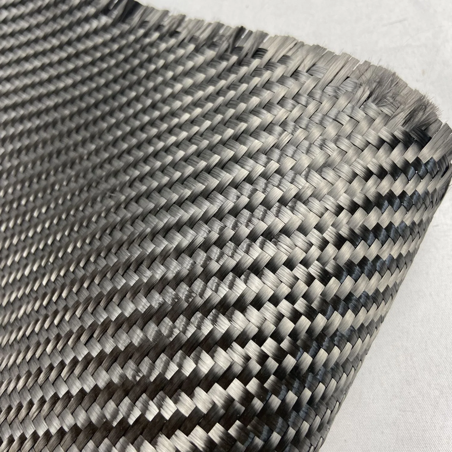 High Modulus 12K 600G Plain or 2*2 Twill Carbon Fiber Fabric China Carbon Fiber Professional Manufacturer