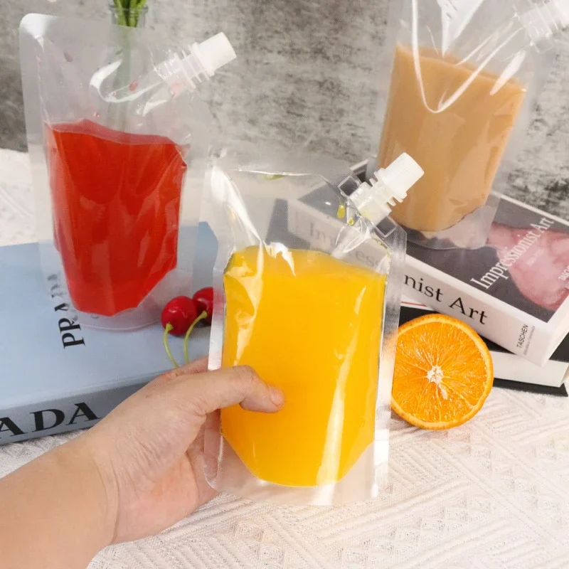 Wholesale Transparent Liquid Packaging Bags Drinking Plastic Juice Beverage Sealed Clear Stand Up Storage Pouches